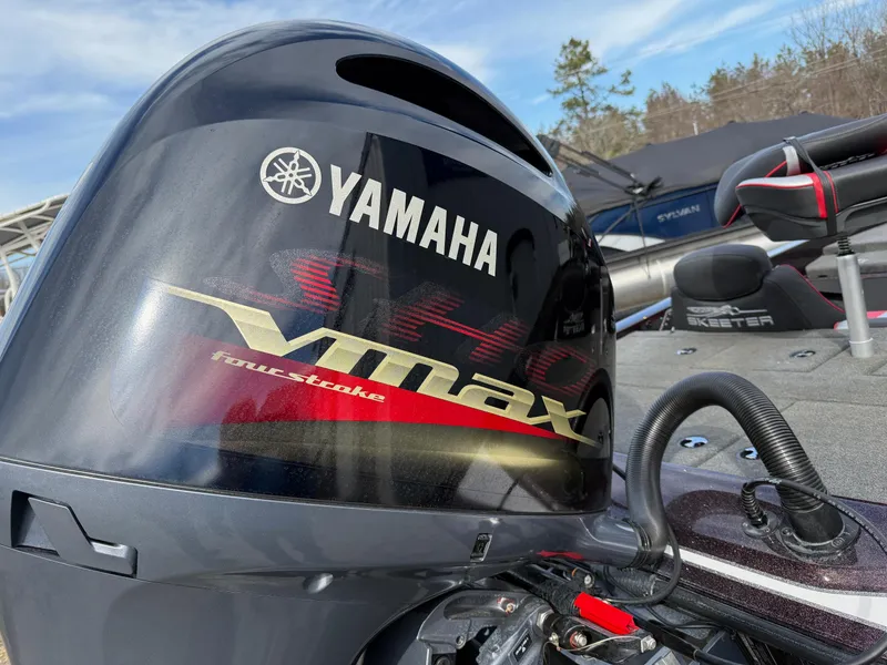 Slide: The Image of Yamaha VMAX engine on 2021 Skeeter ZX 150 boat, outdoor setting. - 13