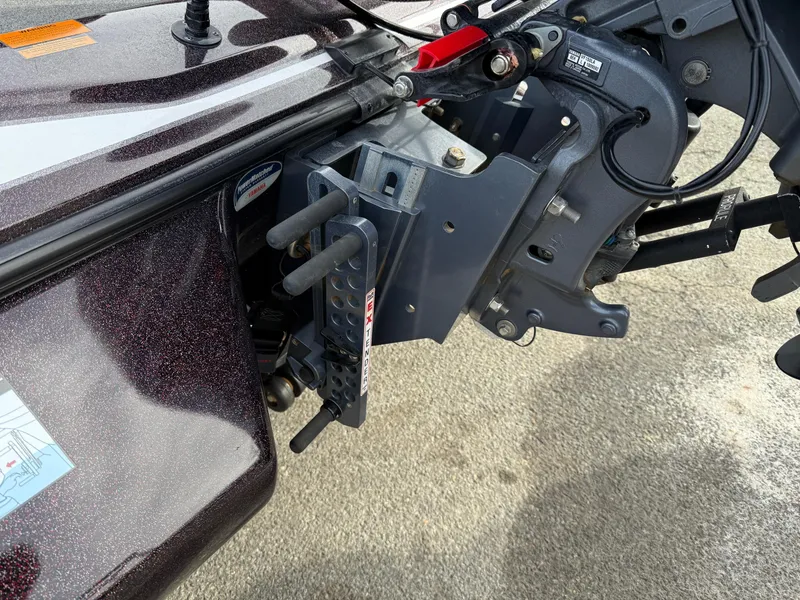 Slide: The Image of 2021 Skeeter ZX 150 boat motor mount detail with metallic finish and hardware components. - 15