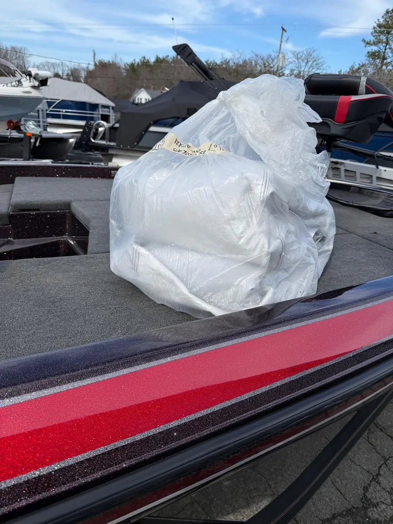 Slide: The Image of 2021 Skeeter ZX 150 boat with a plastic-wrapped package on deck. - 20