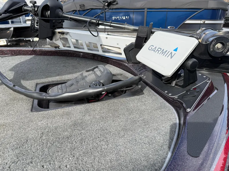 Slide: The Image of 2021 Skeeter ZX 150 boat deck with Garmin navigation system and trolling motor. - 5