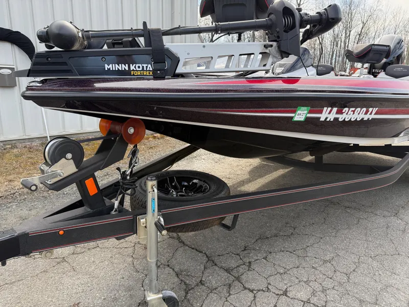 Slide: The Image of 2021 Skeeter ZX 150 boat on trailer with Minn Kota Fortrex motor. - 8