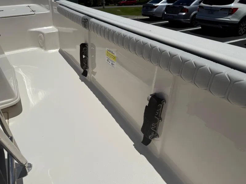 Slide: The Image of 2025 Carolina Skiff 19 LS interior detail, showing seating and storage features. - 10
