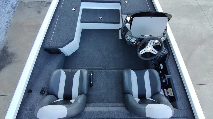 Slide: The Image of 2026 Vexus AVX181D boat interior with dual seats and steering console. - 11