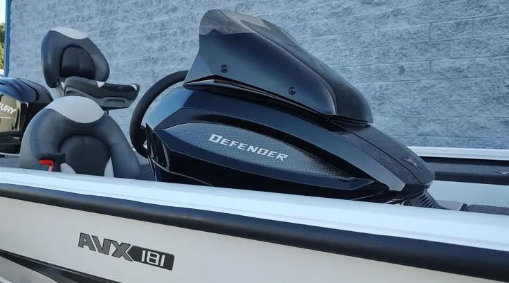 Slide: The Image of 2026 Vexus AVX181D boat with Defender console, sleek design, and comfortable seating. - 9