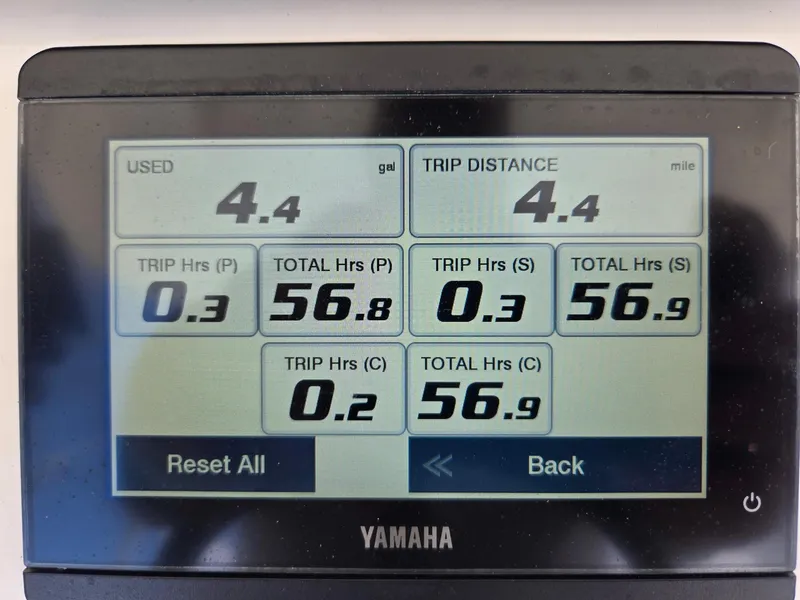 Slide: The Image of Digital display showing fuel usage and trip data for a 2023 Regulator 34 boat. - 15