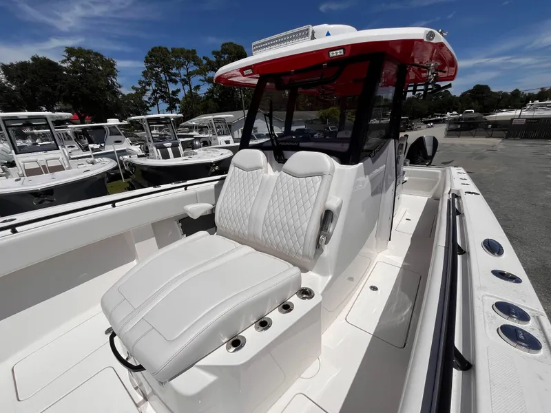 Slide: The Image of 2023 Fountain 38 Tournament Edition boat with luxurious seating and sleek design. - 17