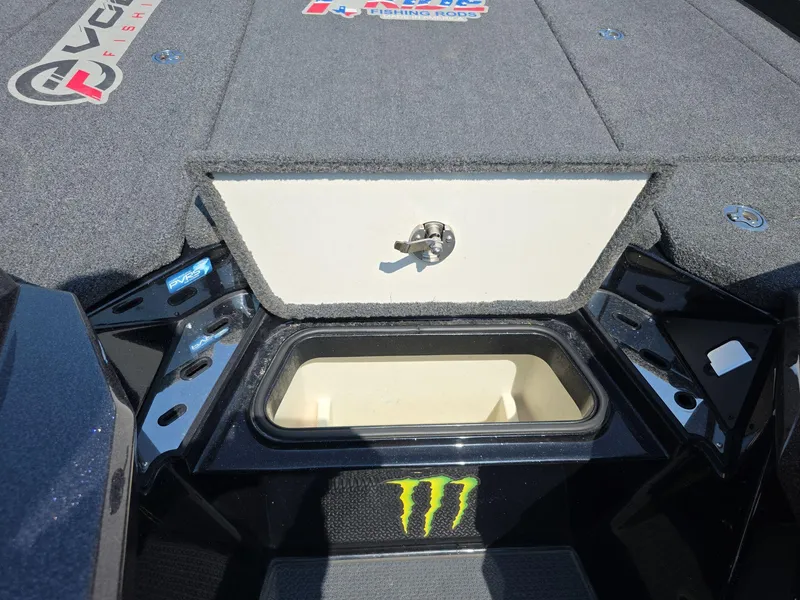 Slide: The Image of 2023 Ranger Z520R 55th Anniversary Limited Edition boat storage compartment with logos and Monster Energy decal. - 11