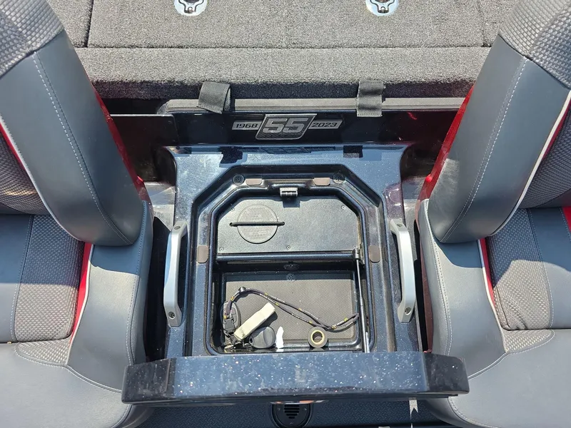 Slide: The Image of 2023 Ranger Z520R 55th Anniversary Limited Edition boat interior with storage compartment. - 12