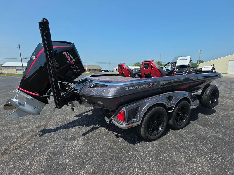 Slide: The Image of 2023 Ranger Z520R 55th Anniversary Limited Edition boat with sleek design and powerful engine. - 2