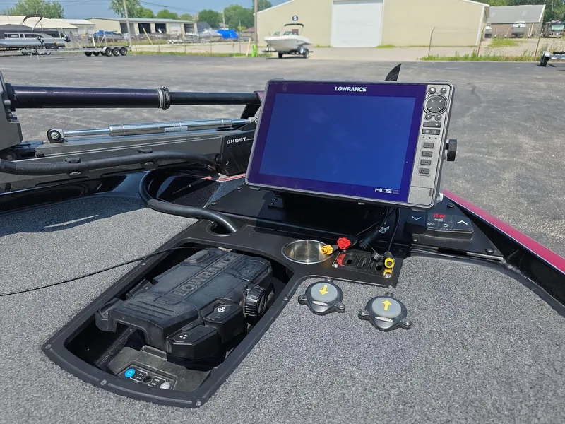 Slide: The Image of 2023 Ranger Z520R 55th Anniversary boat dashboard with Lowrance HDS display and controls. - 9
