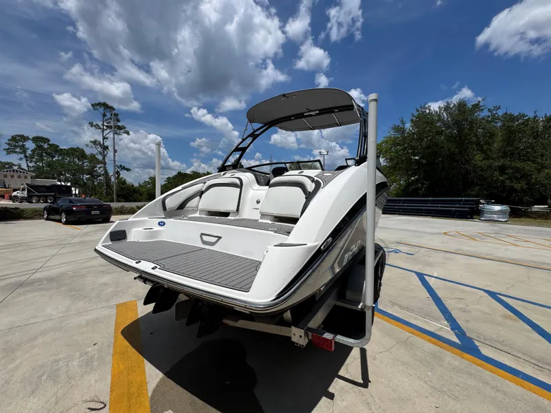 Slide: The Image of 2015 Yamaha Boats AR240 HO on trailer under blue sky. - 13