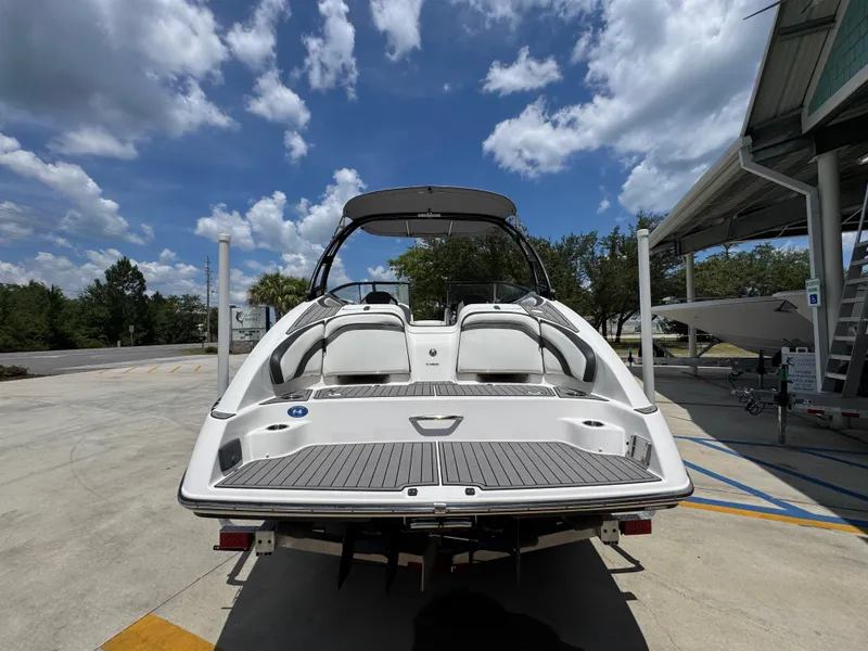 Slide: The Image of 2015 Yamaha Boats AR240 HO on trailer under blue sky. - 15
