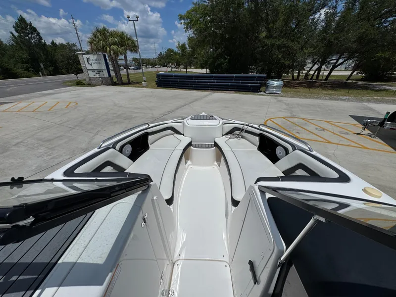 Slide: The Image of 2015 Yamaha Boats AR240 HO interior with spacious seating and modern design. - 19