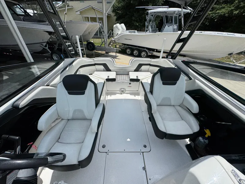 Slide: The Image of 2015 Yamaha Boats AR240 HO interior with dual seating and sleek design. - 30