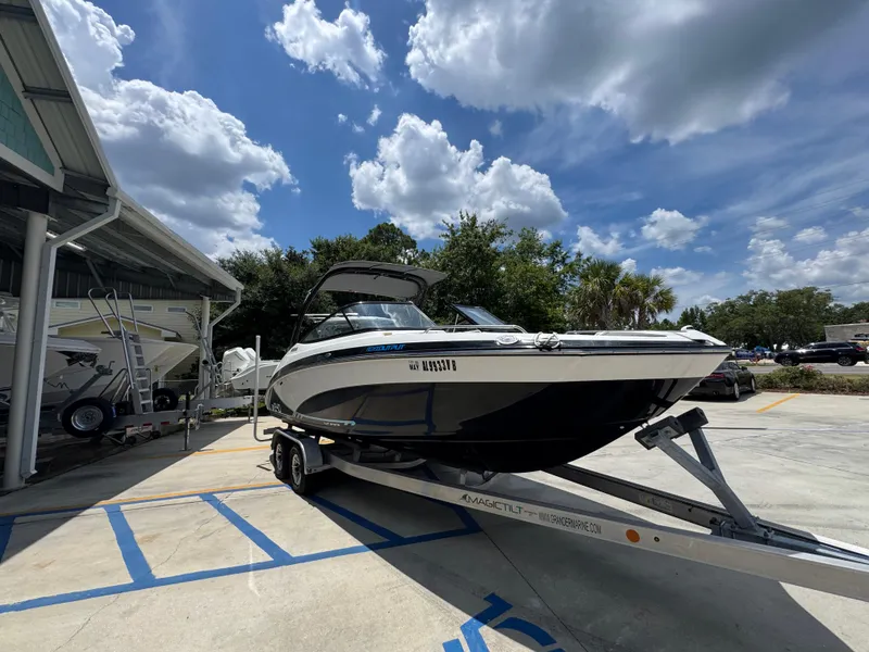 Slide: The Image of 2015 Yamaha Boats AR240 HO on trailer under cloudy sky. - 8