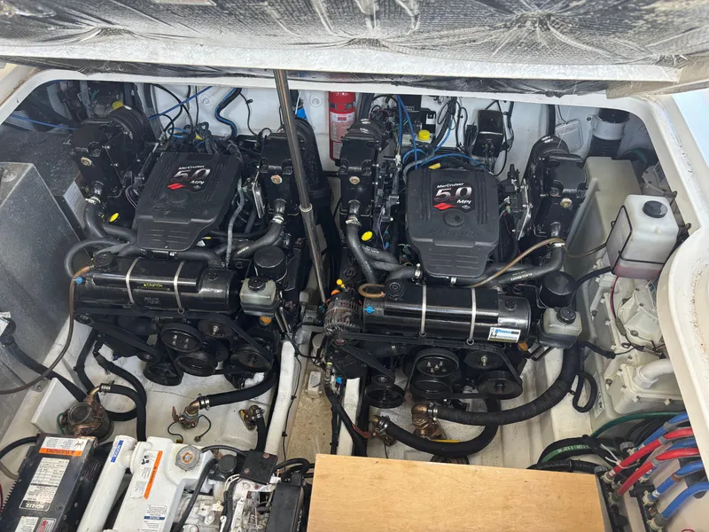 Slide: The Image of Engine compartment of a 2006 Sea Ray 300 Sundancer with twin MerCruiser 5.0 MPI engines. - 22