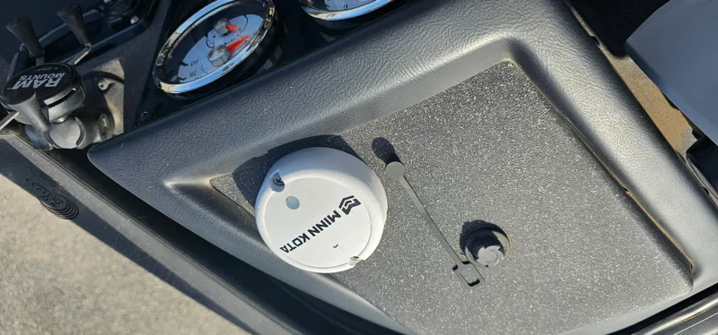 Slide: The Image of Control panel of a 2022 Tracker Tagra V19 boat with Minn Kota accessory. - 14