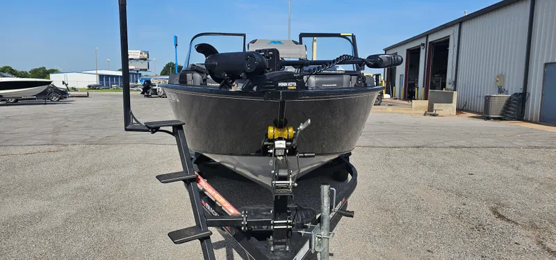 Slide: The Image of 2022 Tracker Tagra V19 boat on trailer in outdoor lot. - 2