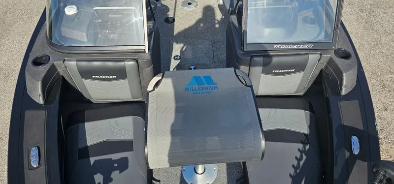 Slide: The Image of 2022 Tracker Tagra V19 boat interior with dual seats and Millennium Marine accessory. - 8