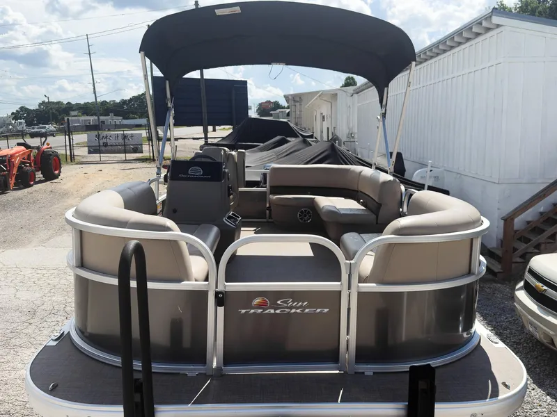 Slide: The Image of 2025 Sun Tracker Party Barge 16 DLX pontoon boat with seating and canopy. - 5