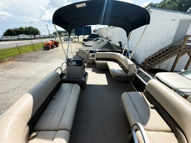 Slide: The Image of 2025 Sun Tracker Party Barge 16 DLX pontoon boat with spacious seating and canopy. - 6