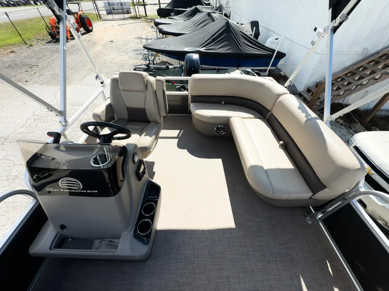 Slide: The Image of 2025 Sun Tracker Party Barge 16 DLX with spacious seating and modern helm. - 8