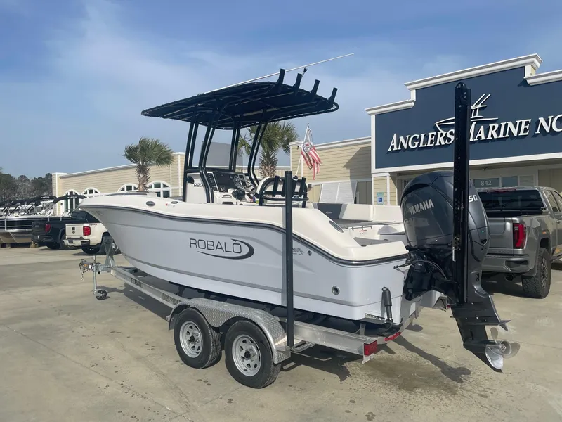 Slide: The Image of 2024 Robalo R200 Center Console boat on trailer at Anglers Marine dealership. - 4