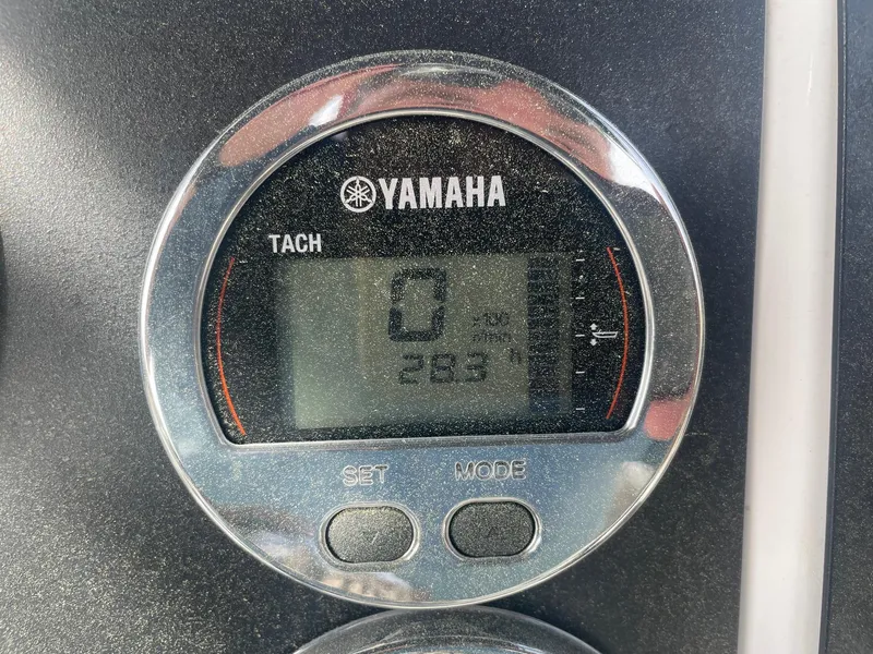 Slide: The Image of Yamaha tachometer on 2024 Robalo R200 Center Console boat dashboard. - 9