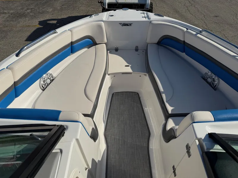 Slide: The Image of 2018 Chaparral Vortex 223 VRX boat interior with blue and white seating. - 1