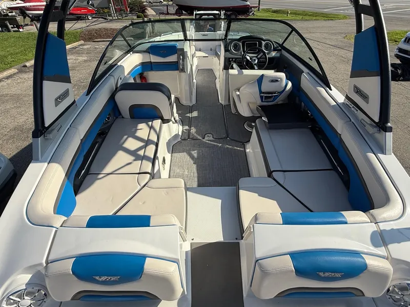 Slide: The Image of 2018 Chaparral Vortex 223 VRX boat interior with blue and white seating. - 3