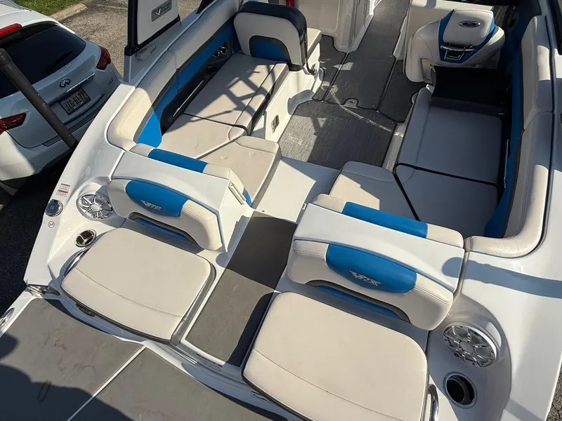 Slide: The Image of 2018 Chaparral Vortex 223 VRX boat interior with blue and white seating. - 4