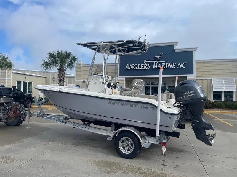Slide: The Image of 2024 Key West 189 FS boat on trailer at Anglers Marine NC dealership. - 1