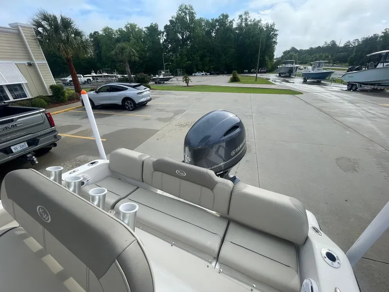 Slide: The Image of 2024 Key West 189 FS boat with Yamaha engine in parking lot. - 10
