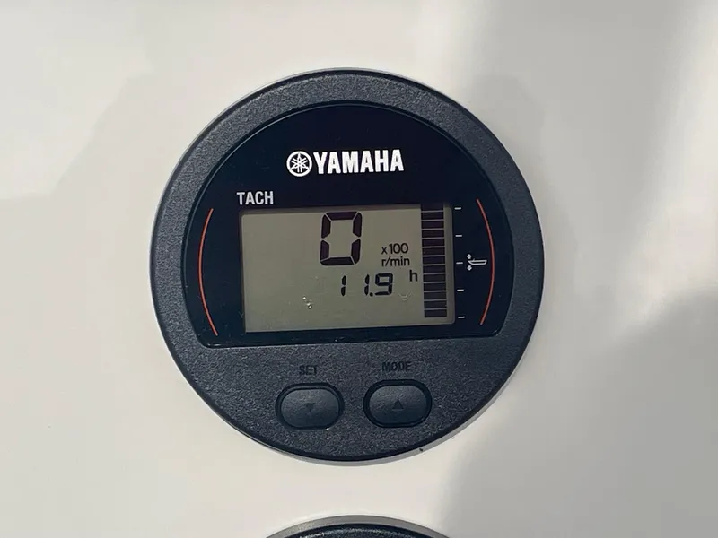 Slide: The Image of Yamaha tachometer display on 2024 Key West 189 FS boat, showing 11.9 hours. - 6
