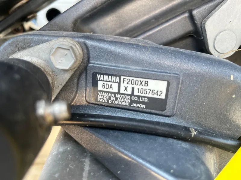 Slide: The Image of Yamaha F200XB engine label on a 2021 Bennington 23L boat. - 31