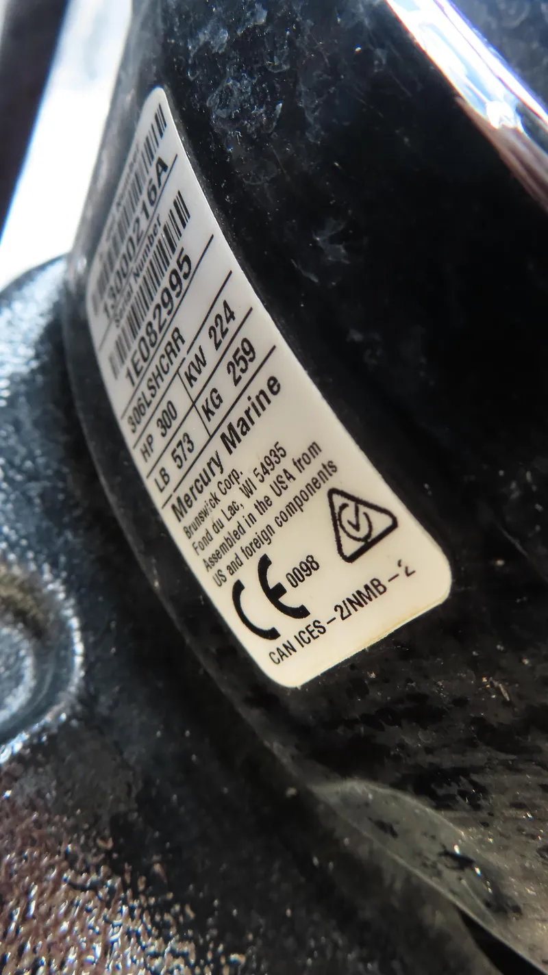 Slide: The Image of Label on Mercury Marine engine, showing specifications and compliance details. - 19