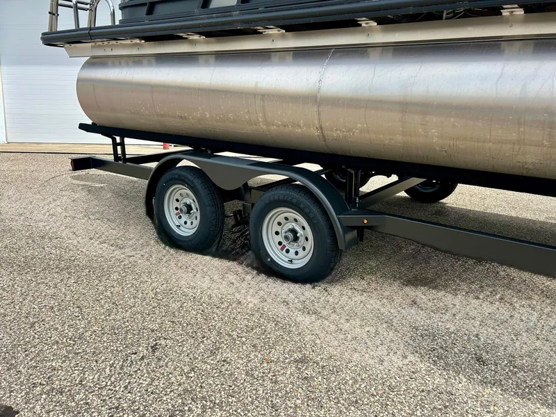 Slide: The Image of 2022 Starcraft CX21 pontoon boat on trailer, side view. - 10
