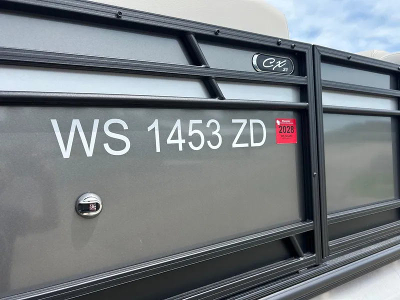 Slide: The Image of 2022 Starcraft CX21 boat with registration WS 1453 ZD and 2028 sticker. - 16