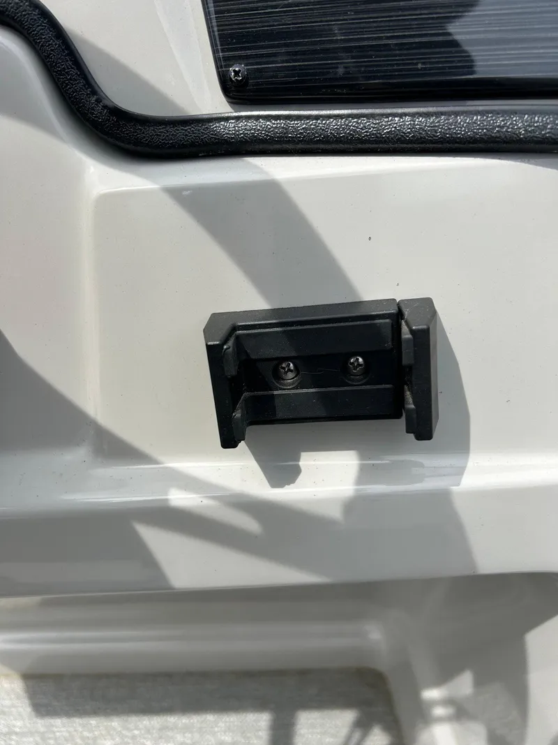 Slide: The Image of 2022 Starcraft CX21 boat detail with mounted black bracket. - 35