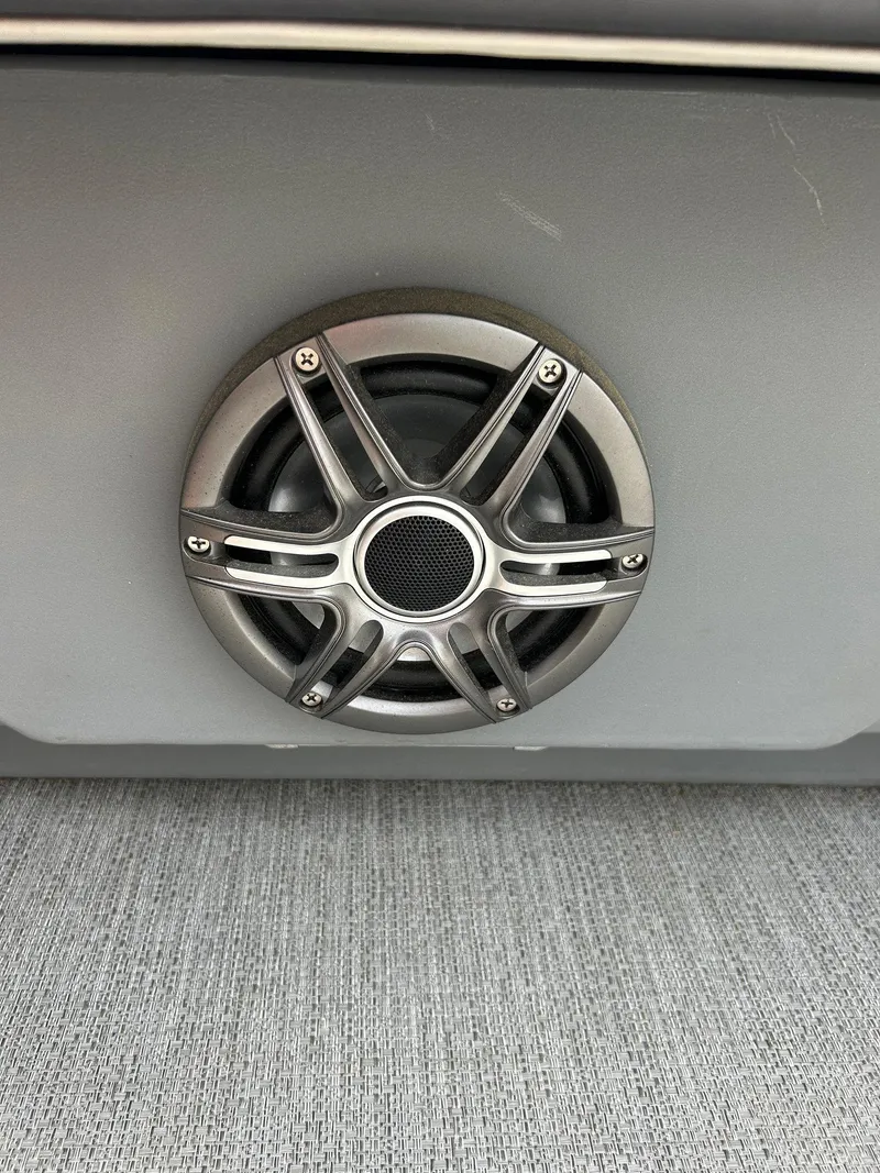 Slide: The Image of Speaker on a 2022 Starcraft CX21 boat, featuring a sleek metallic design. - 42