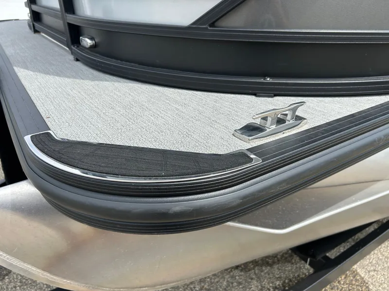 Slide: The Image of 2022 Starcraft CX21 boat deck with cleat, featuring sleek design and durable materials. - 48