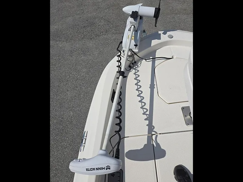 Slide: The Image of 2019 Bayliner Element F21 boat with Minn Kota trolling motor on deck. - 20