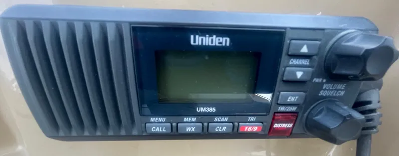 Slide: The Image of Uniden UM385 radio on 2004 Carver 44 Cockpit Motor Yacht dashboard. - 40