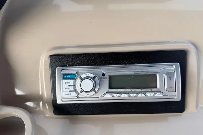 Slide: The Image of 2006 Carver 42 Super Sport stereo system with control panel and display. - 44