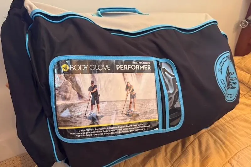 Slide: The Image of Bag containing Body Glove Performer inflatable paddle board, featuring user guide image. - 60