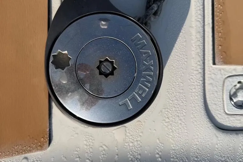 Slide: The Image of Maxwell winch on 2006 Carver 42 Super Sport boat deck, close-up view. - 16