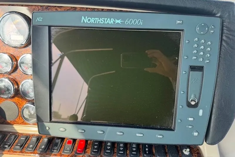 Slide: The Image of Northstar 6000i navigation system on 2006 Carver 42 Super Sport yacht dashboard. - 28