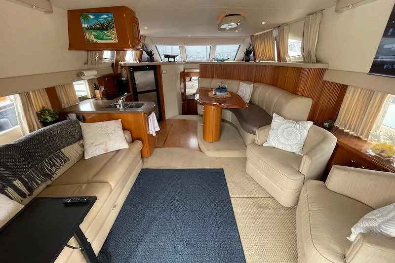 Slide: The Image of Luxurious interior of 2006 Carver 42 Super Sport yacht with modern furnishings. - 38