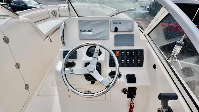 Slide: The Image of 2018 Grady-White Freedom 215 boat dashboard with Garmin navigation system. - 15