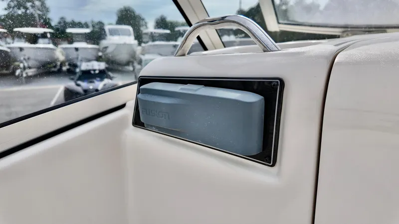 Slide: The Image of 2018 Grady-White Freedom 215 boat interior with Fusion audio system. - 9